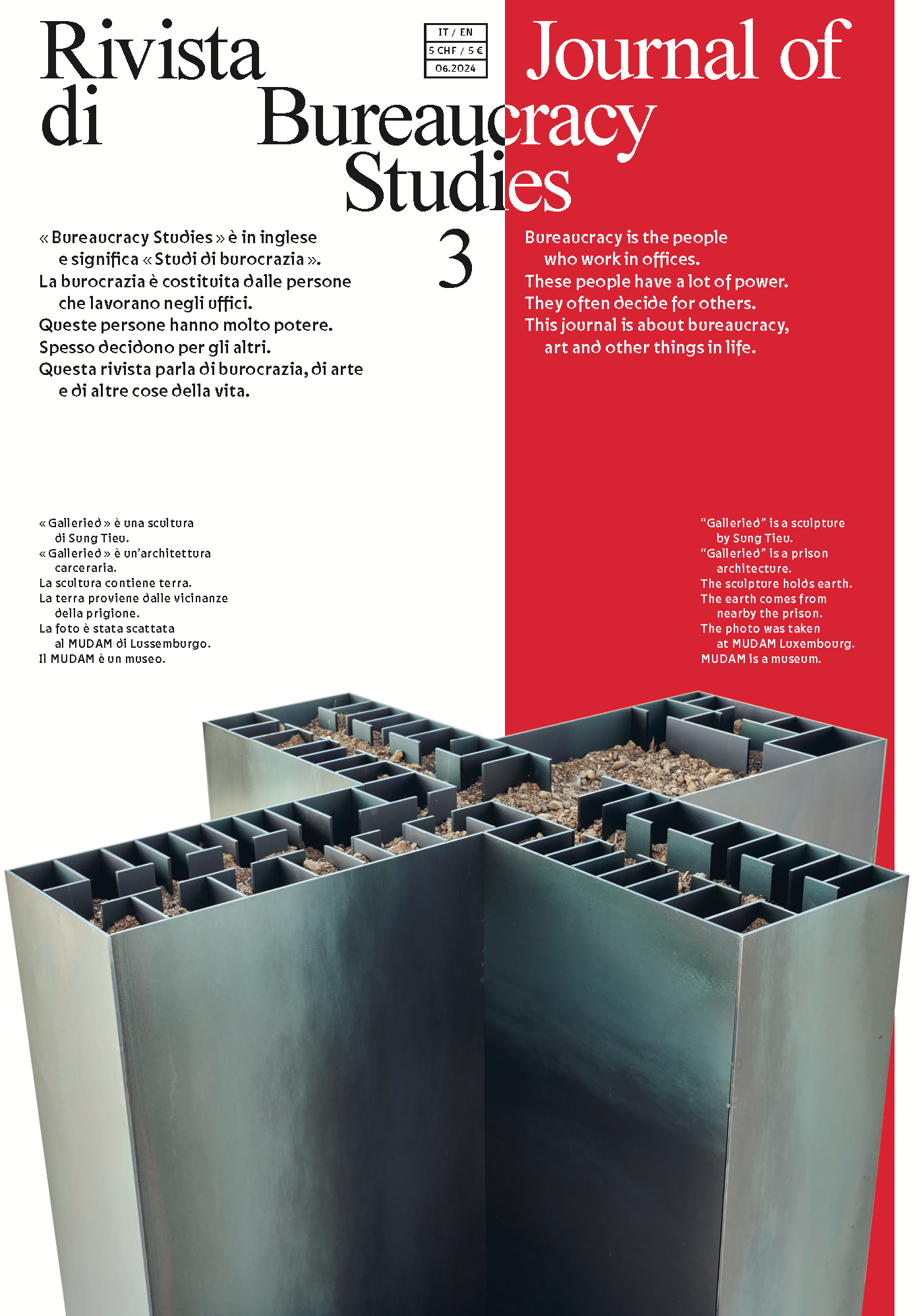 The text on the cover of issue 3 of the Journal of Bureaucracy Studies reads as follows: «Bureaucracy is the people who work in offices. These people have a lot of power. They often decide for others. This journal is about bureaucracy, art and other things in life.» The image description of the grey object looking like a Swiss cross reads: “Galleried” is a sculpture by Sung Tieu. “Galleried” is a prison architecture. The sculpture holds earth. The earth comes from nearby the prison. The photo was taken at MUDAM Luxembourg. MUDAM is a museum.